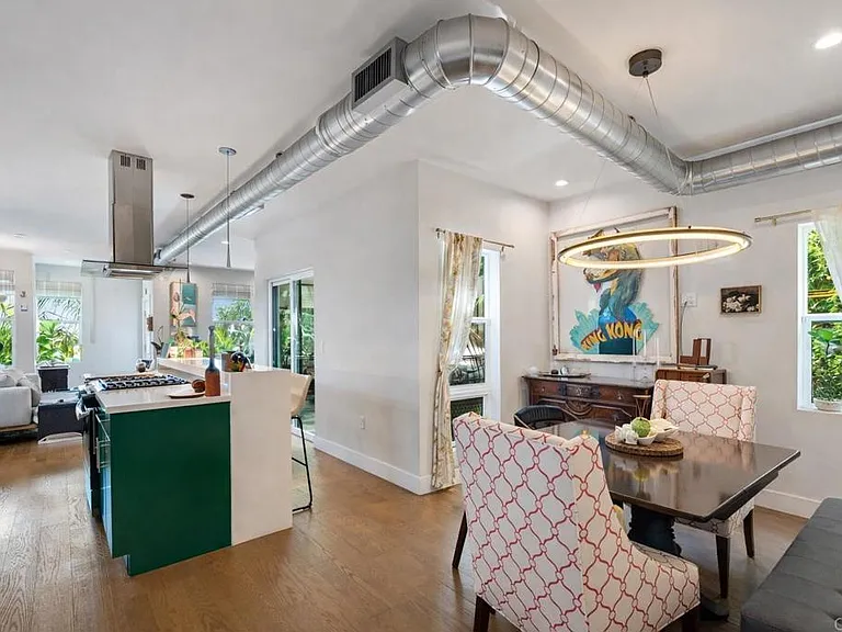 Dining area with exposed ductwork